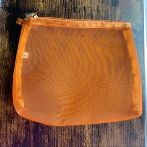 Orange mesh pouch